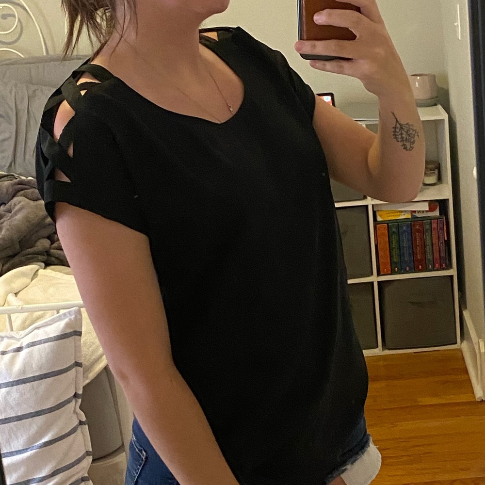 Express top with cut outs on the sleeves